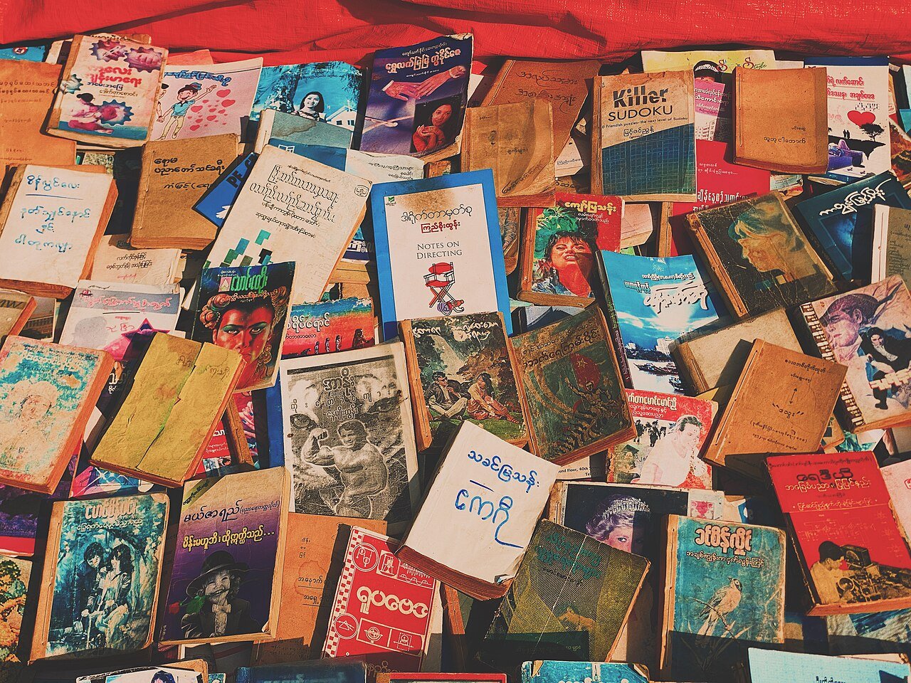 Books on sale by a street side vendor on Pansodan Road in Yangon.jpg