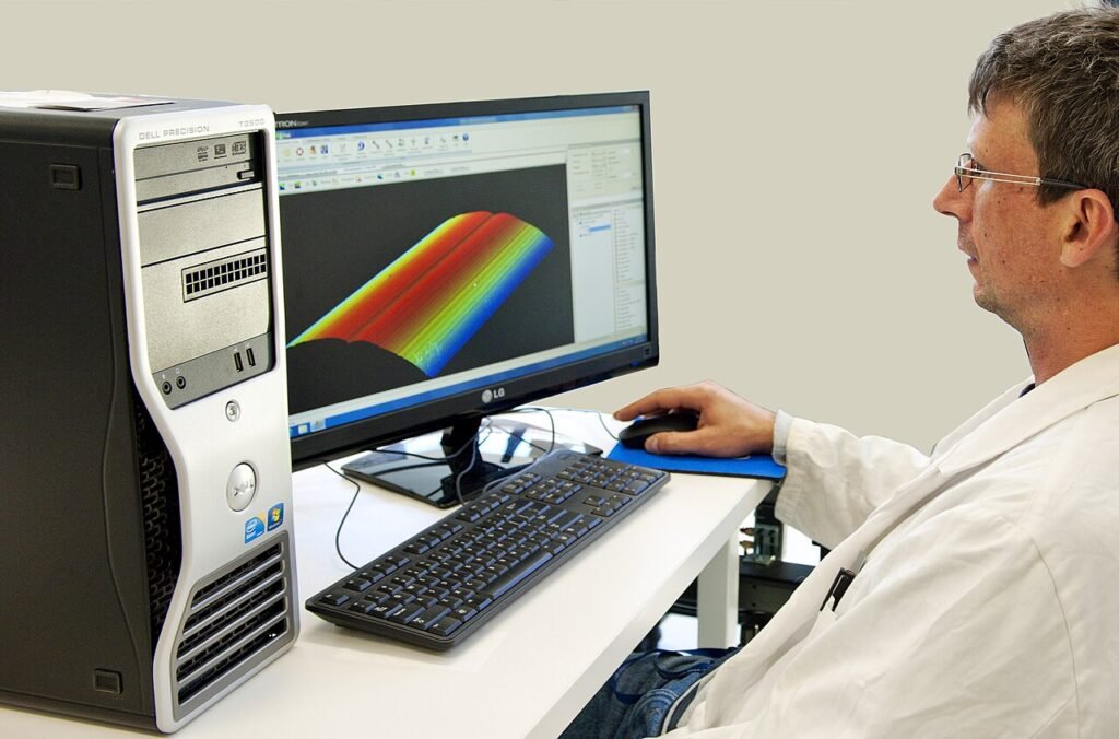 Scientist working with personal computer, 2013 (Dell Precision T3500 W