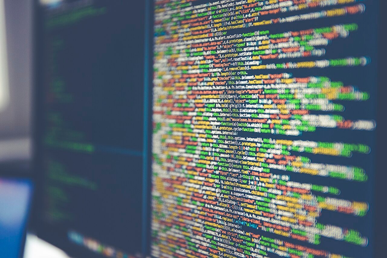 Code on computer monitor (Unsplash)